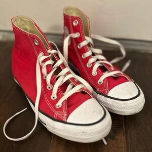 Women’s size 8 red high top converse barely worn.